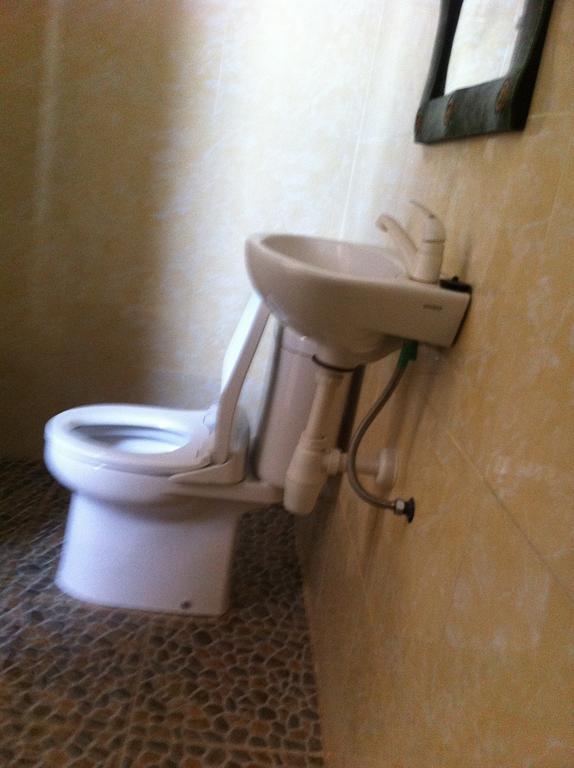 Amed Sari Beach Guesthouse Chambre photo