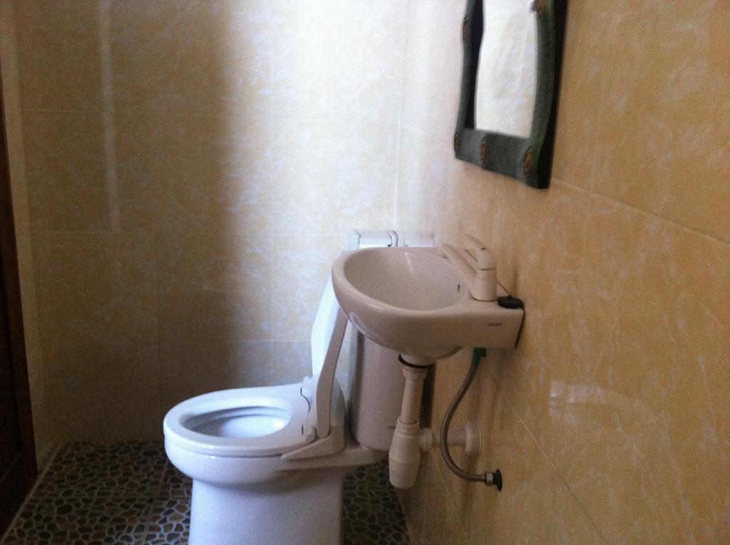 Amed Sari Beach Guesthouse Chambre photo