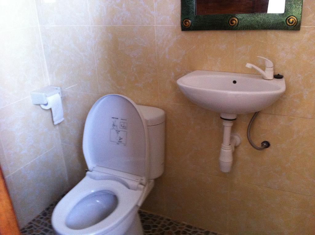 Amed Sari Beach Guesthouse Chambre photo