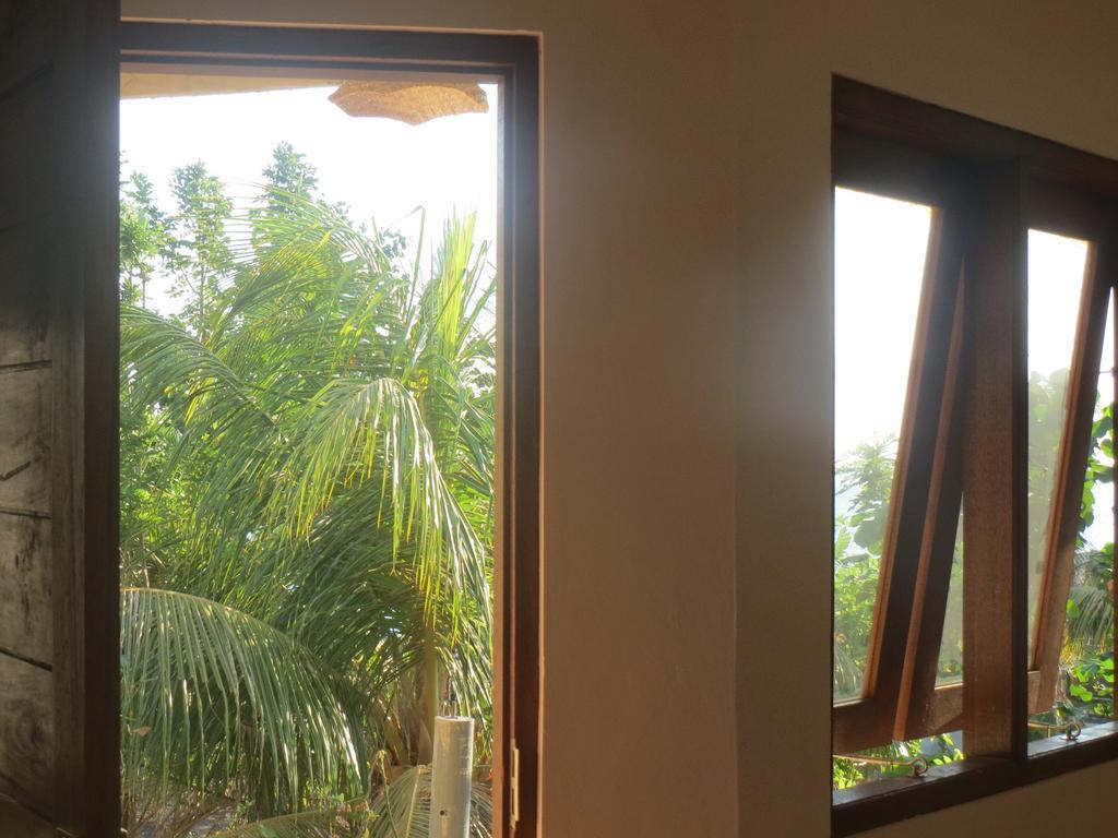 Amed Sari Beach Guesthouse Chambre photo