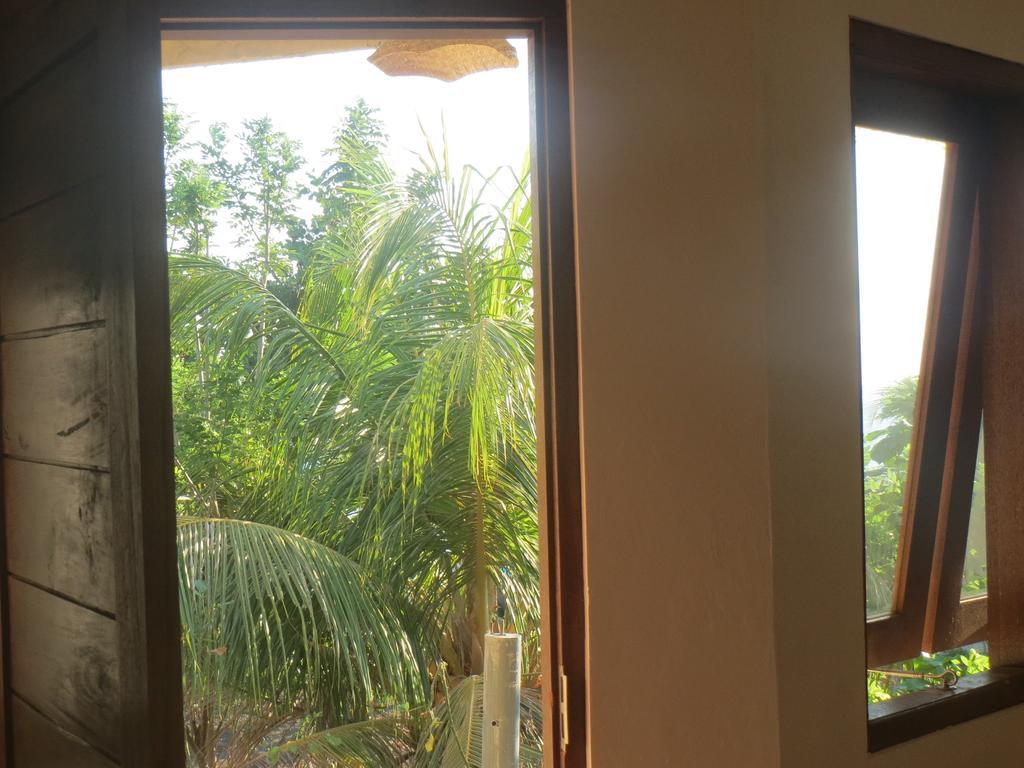 Amed Sari Beach Guesthouse Chambre photo